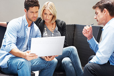 Young couple meeting with financial planner