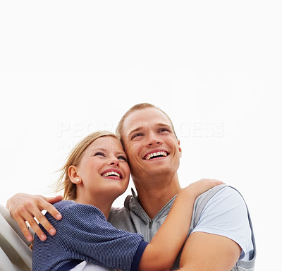 Young couple enjoying their sea voyage in a sailboat, white background