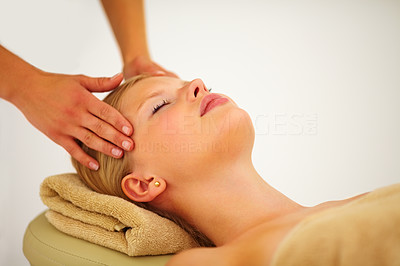 Closeup of a young woman getting a massage at the spa