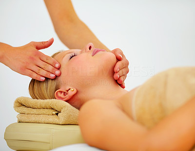 Young woman getting a massage at the spa