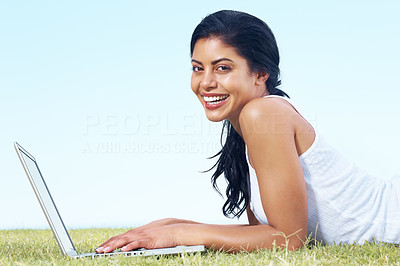 Beautiful young female working on laptop