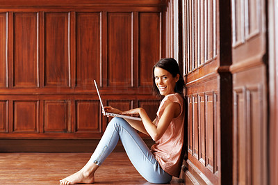 Happy young lady smiling with laptop - Copyspace