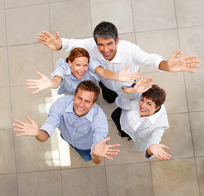 Top view of business colleagues showing a gesture