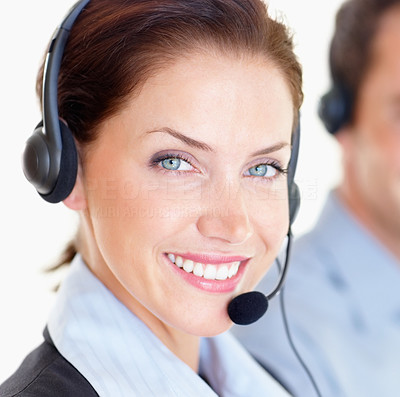 Happy young woman working at a call centre