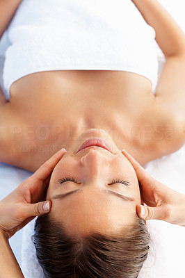Top view of a woman getting a massage in the spa