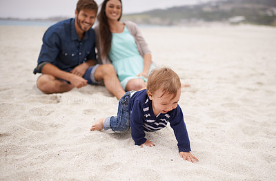 The soft sand provides cushioning for crawling