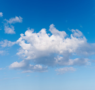 A photo of white clouds and blue sky