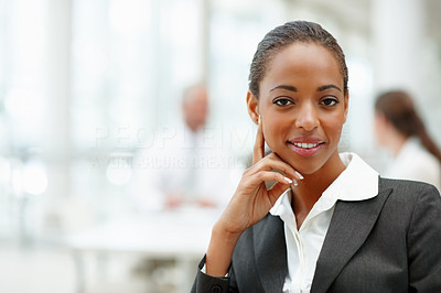 A smiling young African American business woman