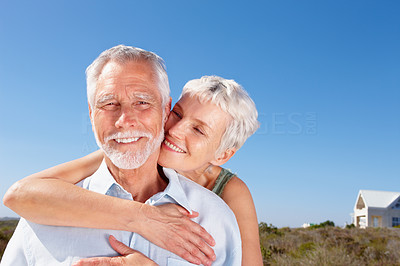 A romantic senior old couple enjoying at a vacation