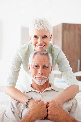A romantic senior old couple together at home