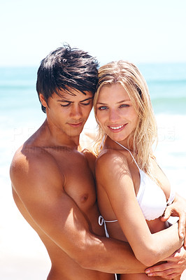 Cute romantic couple together at the beach