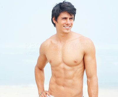 Masculine young man standing outside