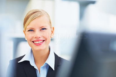 Closeup portrait of a happy smiling woman against blur background