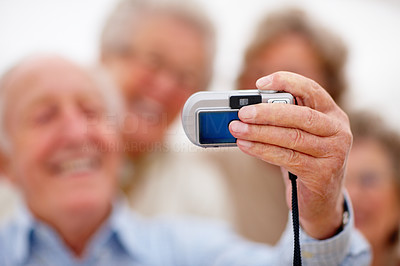 Selp portrait - Macro blur of older people taking picture