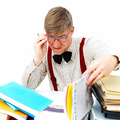 Frustrated student sitting with pile of books