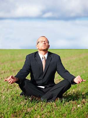 Zen meditation - Businessman doing zen