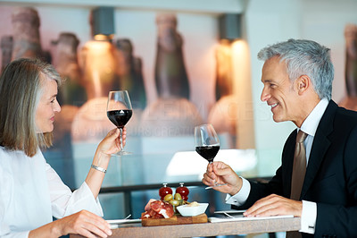 Mature couple having romantic dinner in a restaurant