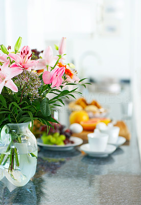 Flowers on breakfast table.