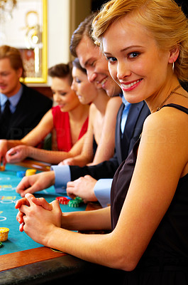 Portrait of a female at the poker table