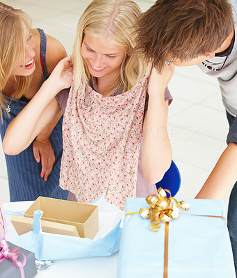 Friends looking at gifts
