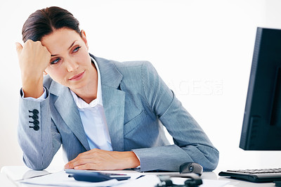 Thoughtful executive looking at computer