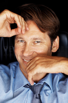 Closeup portrait of successful businessman smiling
