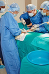 Life saving surgeons hard at work