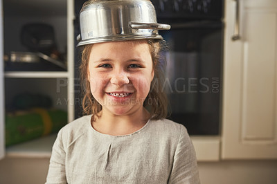 Buy stock photo Cropped portrait of a little girl wearing a pot on her head