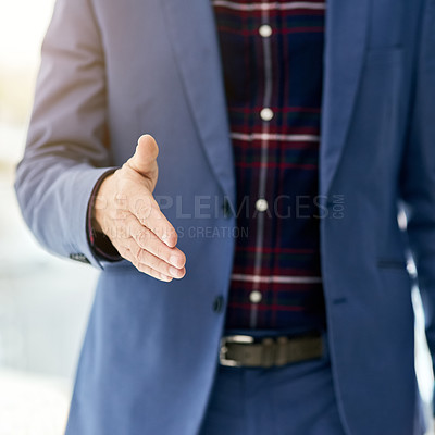 Buy stock photo Closeup shot of a businessman gesturing for a handshake