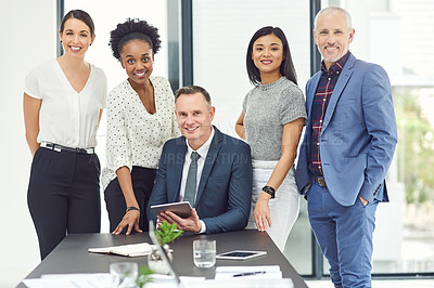 Buy stock photo Portrait of a group of businesspeople working together in a modern office