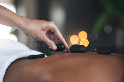 Sore muscles? A hot stone massage will fix it