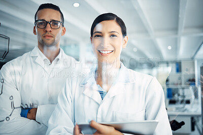 Buy stock photo Shot two a young scientists solving equations on a glass screen in a laboratory