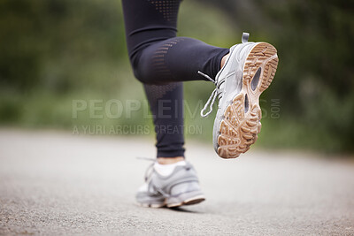Buy stock photo Closeup shot of an unrecognisable woman running outdoors