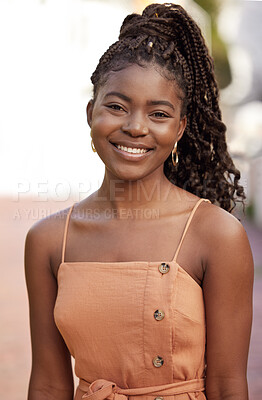 Buy stock photo Shot of a young female standing outside