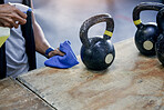 Performing regular cleaning and maintenance of gym equipment