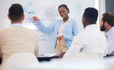Buy stock photo Shot of a young businesswoman giving a presentation