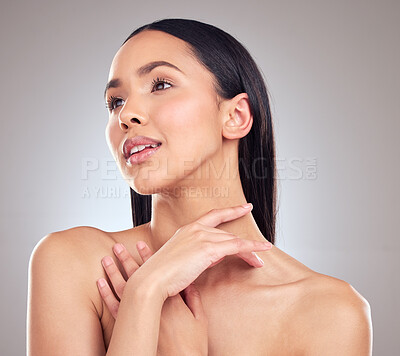 Buy stock photo Shot of an attractive young woman posing alone in the studio
