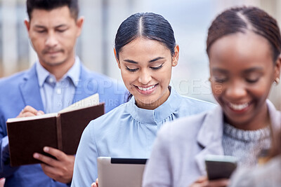 Buy stock photo Shot of a group of businesspeople in a line at work