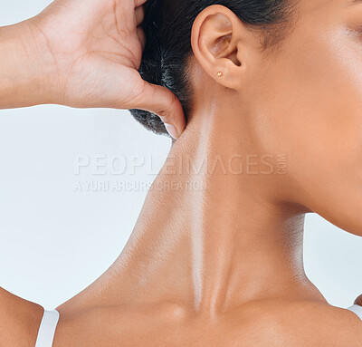 Buy stock photo Cropped shot of an unrecognisable woman posing alone in the studio