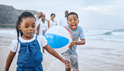 Buy stock photo Shot of a young brother and sister bonding at the beach