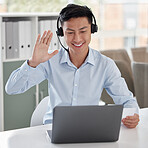 One happy asian businessman talking on headset and waving to greet colleagues during virtual teleconference meeting via video call on laptop in an office. Advisor and rep joining online global webinar