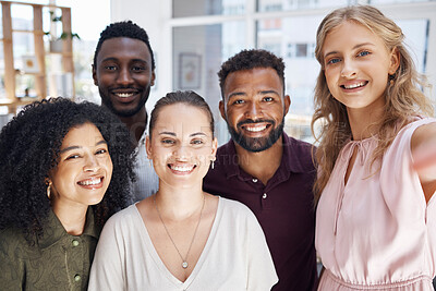 Buy stock photo Portrait of a group of cheerful diverse businesspeople taking a selfie together at work. Happy caucasian businesswoman taking a photo with her joyful colleagues