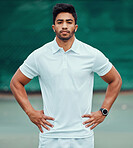 Portrait of serious indian tennis player standing alone on a court. Fit ethnic sports professional with hands on hips and feeling confident in a sports club. Ready for an athletic and healthy game