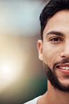 Half face portrait headshot of smiling mixed race tennis player on court with copyspace. Happy fit confident hispanic sports professional standing alone in sports club. Ready for athletic healthy game