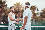 Two ethnic tennis players shaking hands before playing court game. Smiling athletes team standing and using hand gesture and handshake for good luck. Play competitive sports match for health fitness