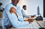 Closeup of one stressed african american businesswoman suffering with arm and shoulder pain in an office. Entrepreneur rubbing muscles and body while feeling tense strain, discomfort and hurt from bad sitting posture and long working hours at desk