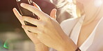 businesswoman using her smartphone while walking to work. Closeup on the hands of a businesswoman sending a text message on her cellphone. A businesswoman using an online app on her wireless phone